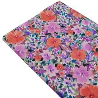 Tela de popelín con estampado de flores en tonos rosas y malvas