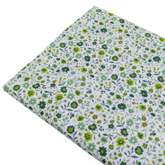 Tela de popelín con estampado de flores tipo liberty en color verde pistacho