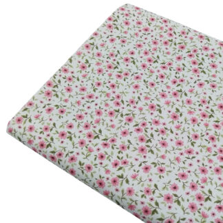 Tela de popelín con estampado de flores tipo liberty en color rosa empolvado