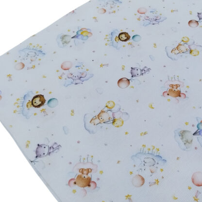 Tela piqué de canutillo con estampado de ositos, leoncitos, hipopótamos, ratoncitos, globos, estrellas y lunas
