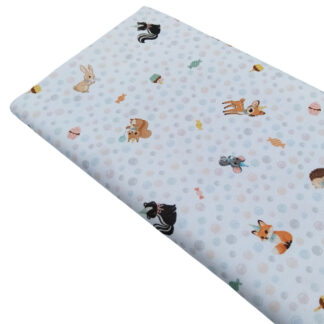 Tela de piqué de canutillo con estampado de animalitos y pompas