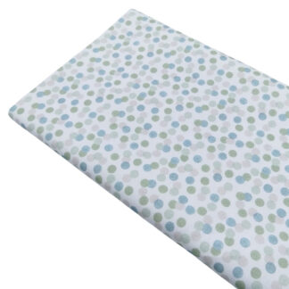 Tela de piqué de canutillo con estampado de pompas en tonos jade y menta