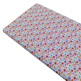 Tela de popelín con estampado de flores de colores
