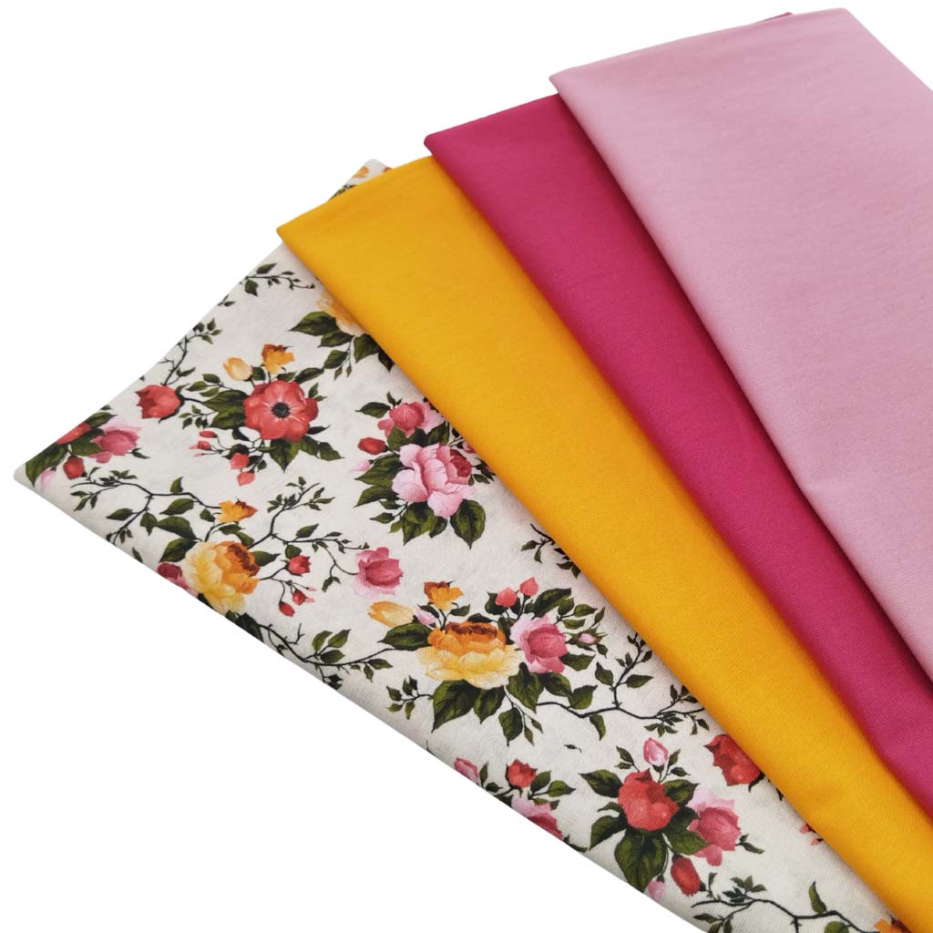 Telas de colores lisos combinables con el popelín con estampado de ramos de rosas de colores sobre fondo beige