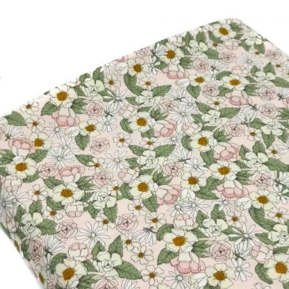 Tela de popelín de algodón orgánico estampado con flores tonos pastel