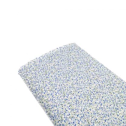 Tela de popelín de algodón orgánico estampado con flores azules tipo liberty