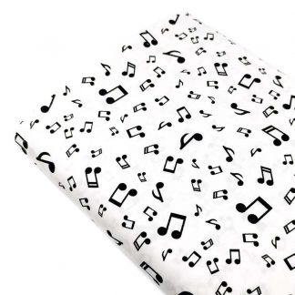 Tela popelín de algodón orgánico estampado con notas de música de color negro sobre fondo blanco