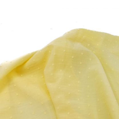 Tela de plumeti en color amarillo pálido