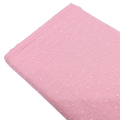 Tela plumeti de batista en color liso rosa palo