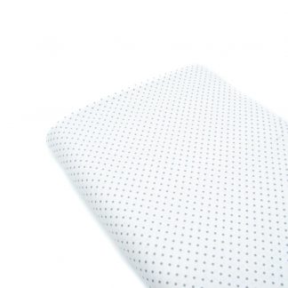 Tela de popelín 100% algodón con estampado de topos grises pequeños sobre fondo color blanco diseñado by Poppy Europe