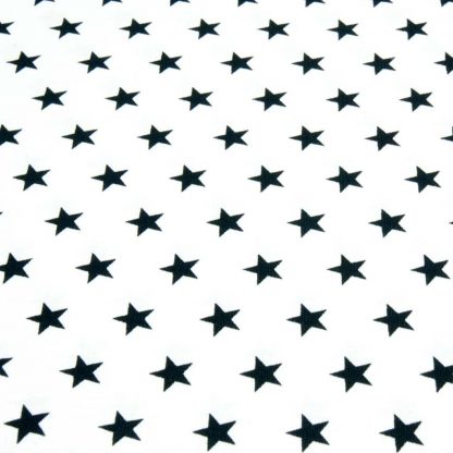 Tela de popelín 100% algodón con estampado de estrellas negras pequeñas sobre fondo color blanco diseñado by Poppy Europe
