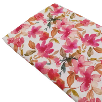 Tela 100% viscosa con estampado de flores de cuadro en tonos rosas