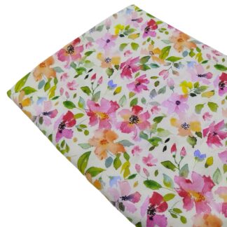 Tela 100% viscosa con estampado de flores de colores rosas