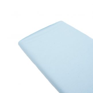 Tela de popelín 100% algodón en color liso azul bebé