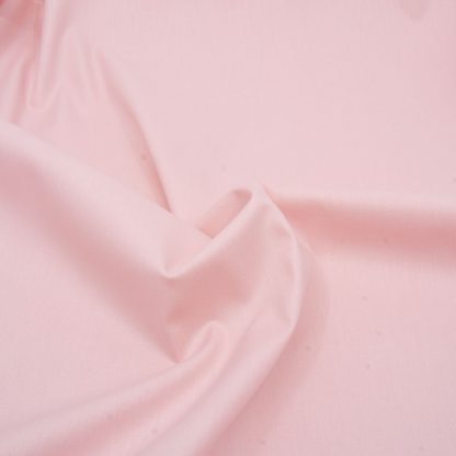 Tela de popelín 100% algodón en color liso rosa palo