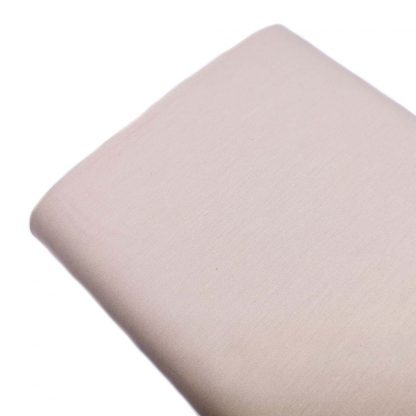 Tela de popelín 100% algodón en color liso hueso