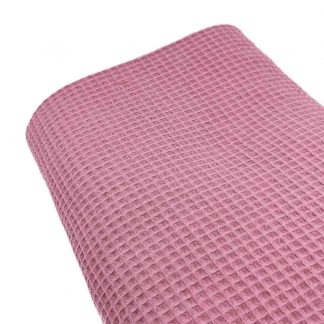 Tela waffle de algodón 100% en color rosa palo