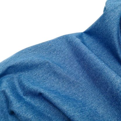Tela denim lisa en algodón color azul medio