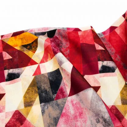 Tela de neopreno con estampado de dibujos geométricos abstractos y de colores