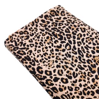 Tela 100% viscosa con estampado animal print leopardo