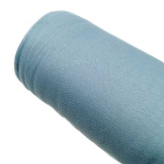 Tela de punto sudadera con pelito interior en color azul empolvado