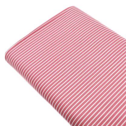 Tela de popelín 100% algodón con estampado de rayas rosa palo y blanca diseñada by Poppy Europe