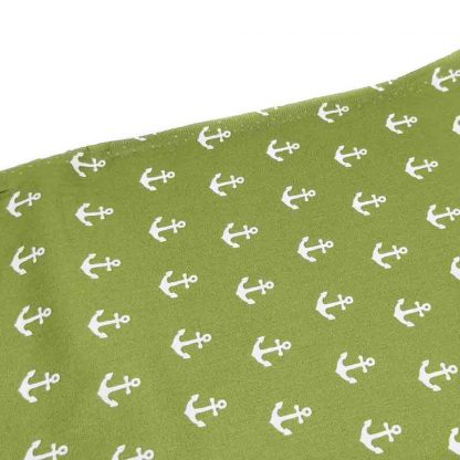 Tela de popelín 100% algodón con estampado de anclas blancas sobre fondo color verde seco diseñado by Poppy Europe