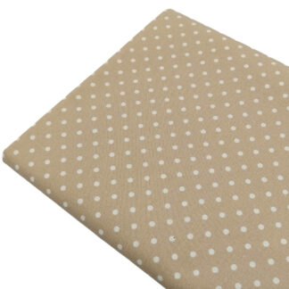 Tela de popelín estampado con lunares de color lino sobre fondo de color beige