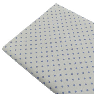 Tela de popelín estampado con lunares de color azul empolvado sobre fondo de color lino