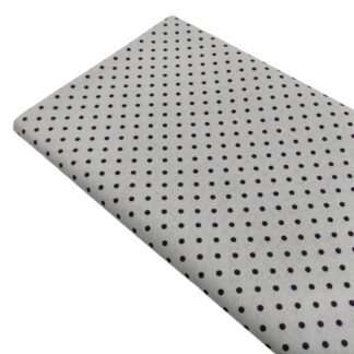 Tela de popelín estampado con lunares de color berenjena sobre fondo de color lino