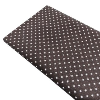 Tela de popelín estampado de estrellas color lino sobre fondo color chocolate