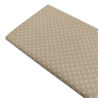 Tela de popelín estampado de estrellas color lino sobre fondo color beige