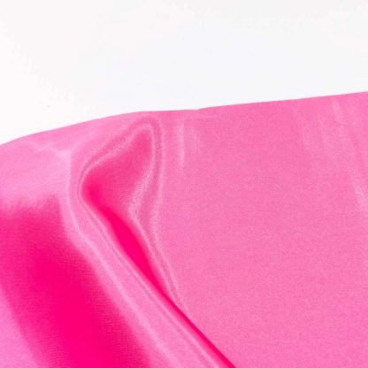 Tela de raso en color liso rosa chicle