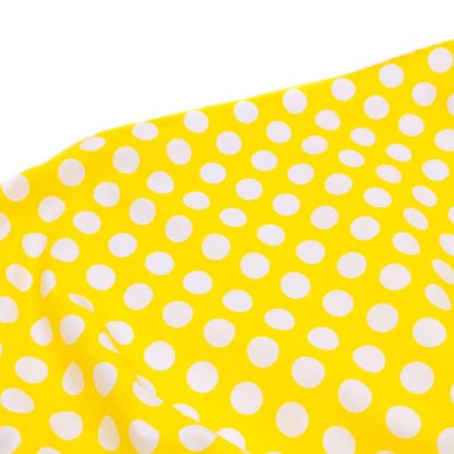Tela popelín con estampado de lunares de flamenca de 15 milímetros de diámetro en color blanco sobre fondo amarillo