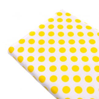 Tela popelín con estampado de lunares de flamenca de 15 milímetros de diámetro en color amarillo sobre fondo blanco