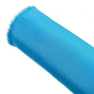 Tela de crespón en color liso azul turquesa