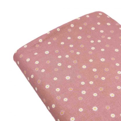 Tela de popelín de algodón orgánico estampado con florecitas sobre fondo rosa palo