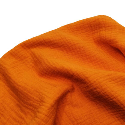 Tela muselina doble gasa algodón en color naranja fluor