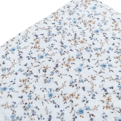 Tela doble gasa muselina con estampado de flores en tono azul