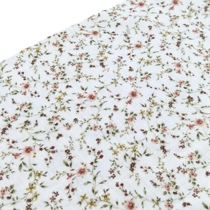 Tela doble gasa muselina con estampado de flores en tono rosa empolvado