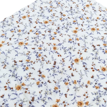 Tela doble gasa muselina con estampado de flores en tono ocre