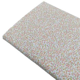 Tela de popelín con estampado de flores tipo liberty serie Rosaura en tonos salmón