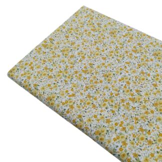 Tela de popelín con estampado de flores tipo liberty serie Prímula en tonos amarillos