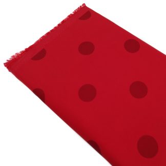 Tela para trajes de flamenca en crep elástico con lunares de 30 milímetros color sangre sobre fondo color rojo