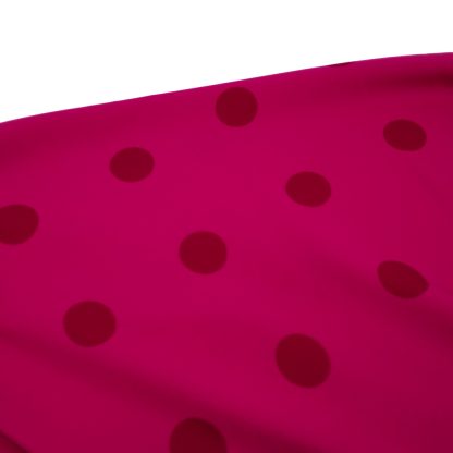 Tela especial para coser trajes de flamenca en crep elástico con estampado de lunares de 30 milímetros color burdeos sobre fondo color buganvilla