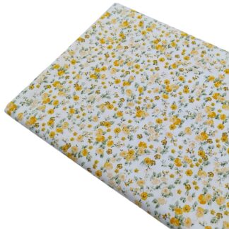 Tela de popelín con estampado de flores tipo liberty serie Rosita en tonos amarillos