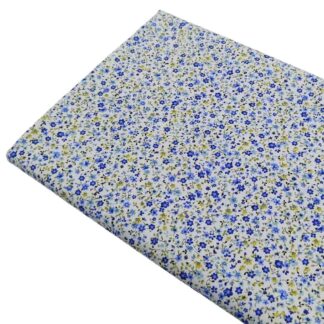 Tela de popelín con estampado de flores tipo liberty serie Brisa en tonos azules