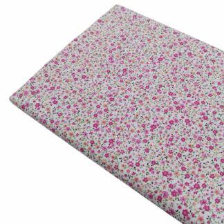 Tela de popelín con estampado de flores tipo liberty serie Brisa en tonos fucsias