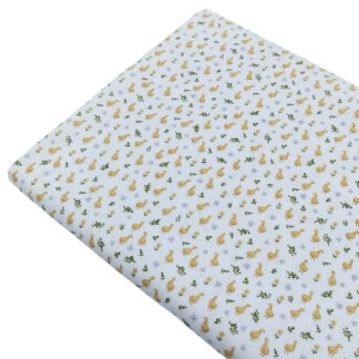Tela de popelín con estampado de patitos en tonos amarillos
