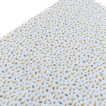 Tela de popelín con estampado de patitos en tonos amarillos